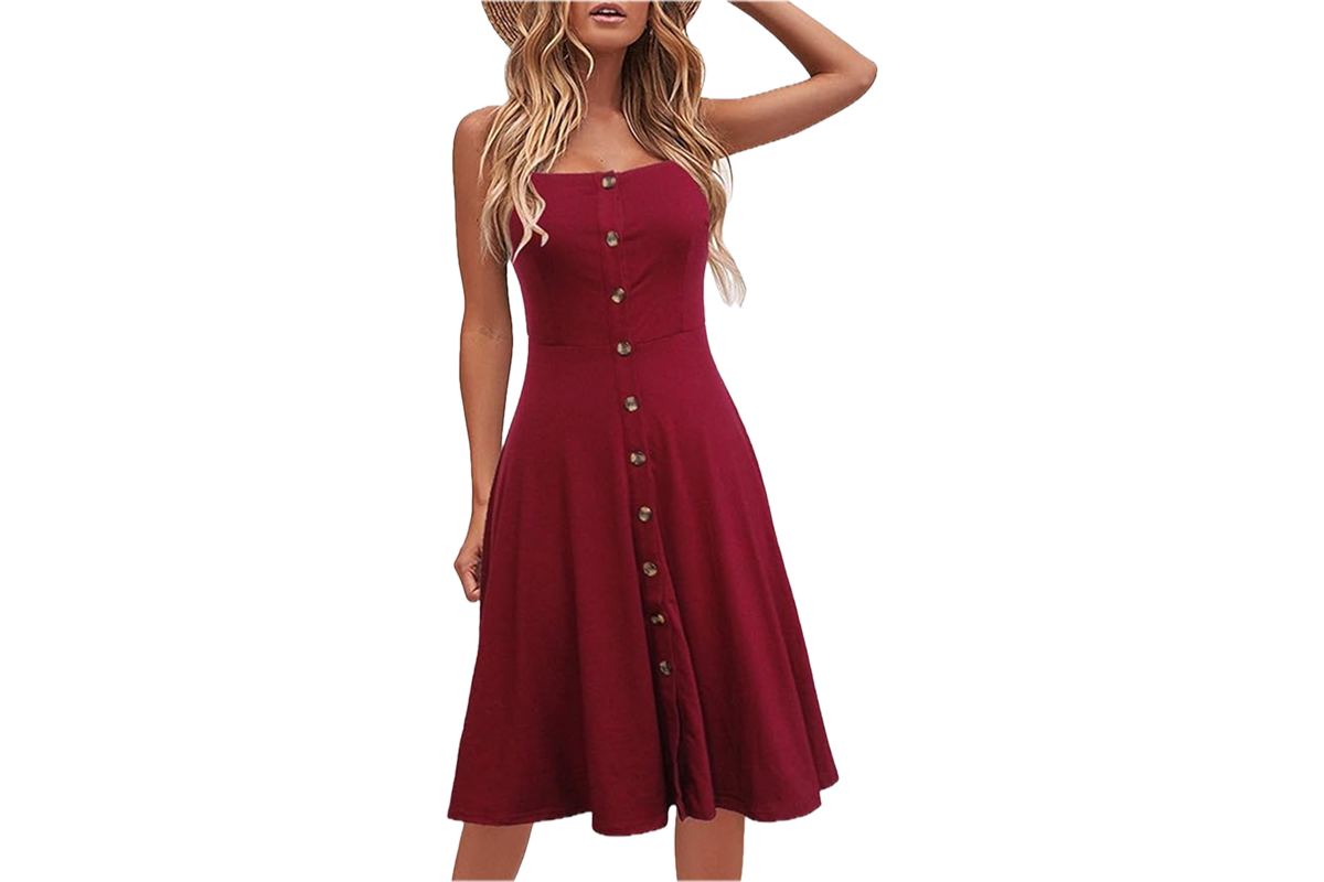 A woman wearing a short, sleeveless, button down dress in red.