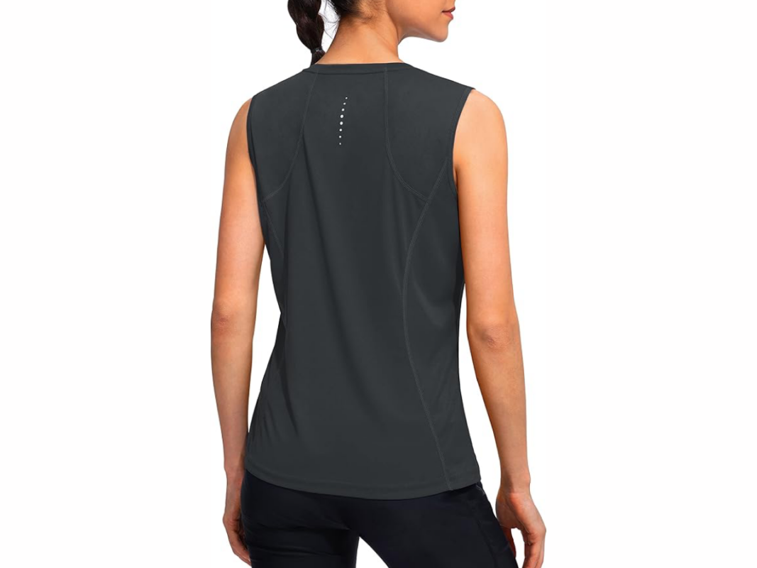 This image features a woman's back. She is wearing a dark grey/green sleeveless tank top.