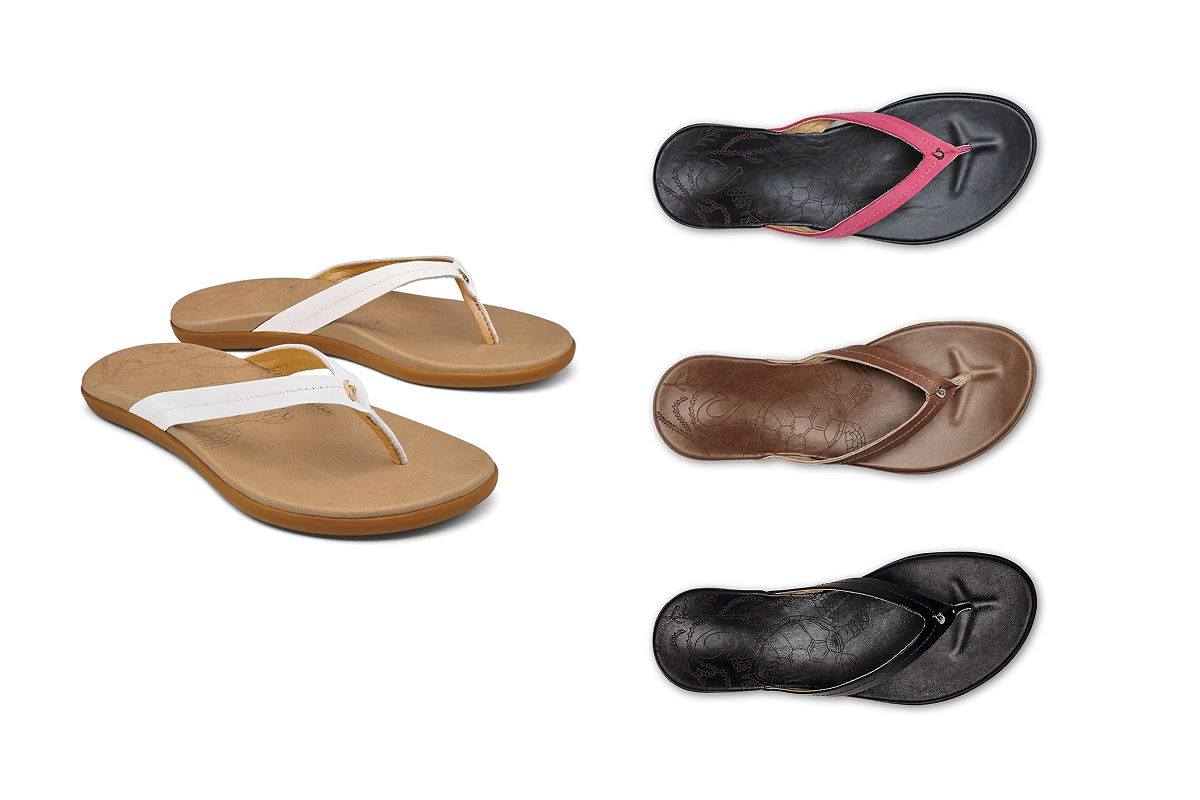 A pair of flip flops with white straps next to a single flip flop with a pink strap, a brown flip flop and a black flop flop.
