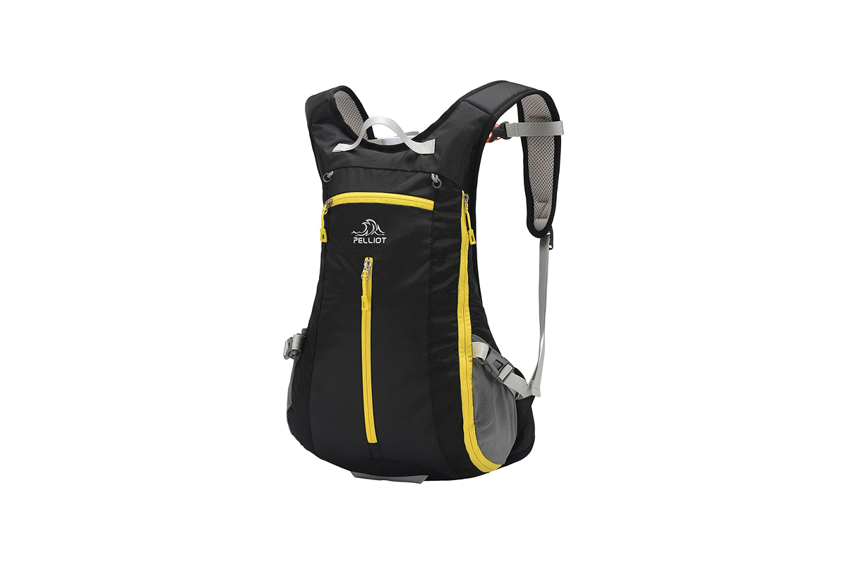 This image features a black daypack with bright yellow trim.