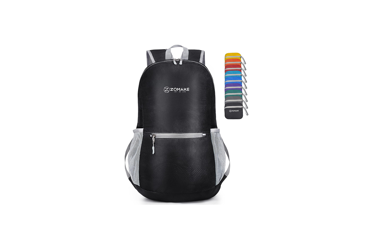 This image features a black backpack with grey mesh pockets and zipper detail.