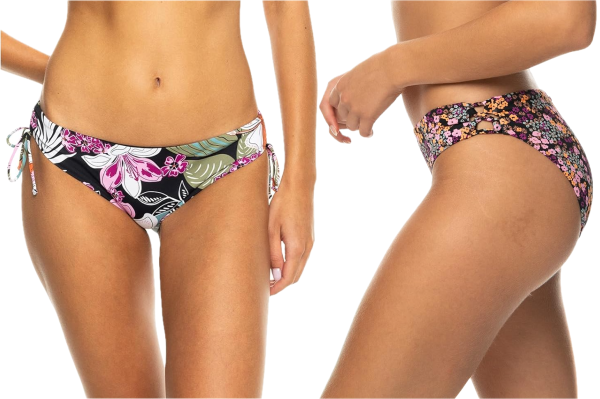 The lower bodies of two women wearing a hipster style bikini bottom with floral designs.