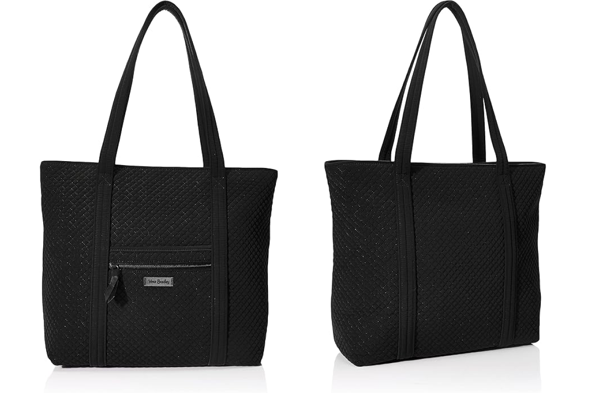 Two views of a black beach tote with long straps. The front view shows a zippered pocket with a label beneath it. The back view displays a simple, solid black design. The bag has a quilted pattern and a sleek, versatile look.