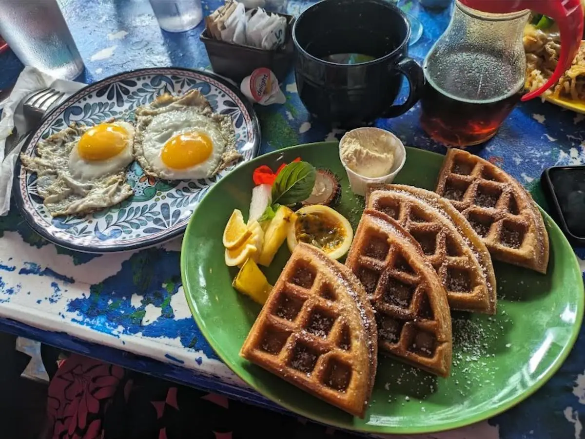 Waffles and Sunny side up eggs for breakfast from Pele's Kitchen in Pahoa on Hawaii Island