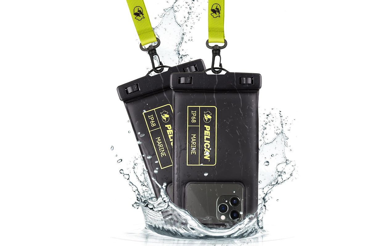 Two black phone pouches attached to a yellow strap are splashing into a puddle of water.