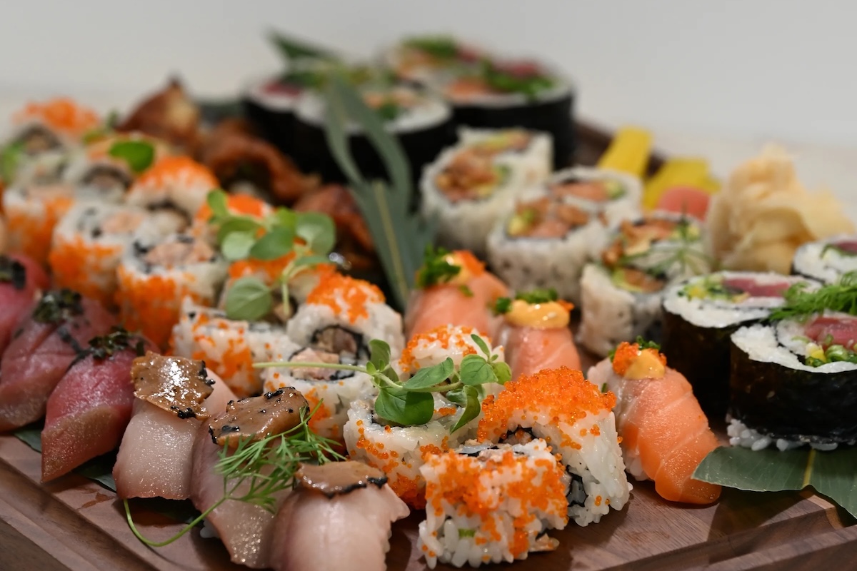 A plate of different sushi rolls.