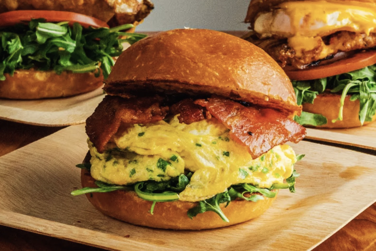Three different breakfast burgers.
