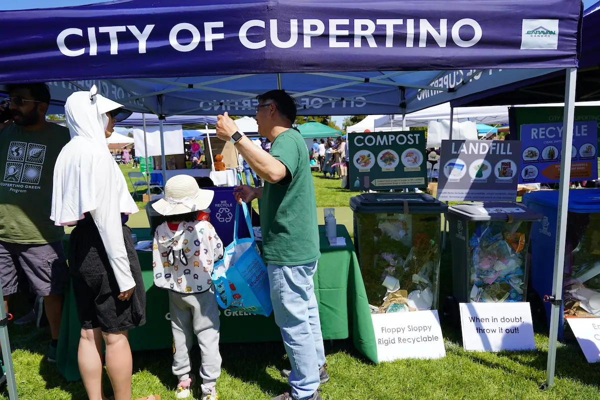 Community members learn how to recycle at the Earth Day and Arbor Day Festival in Cupertino, California.