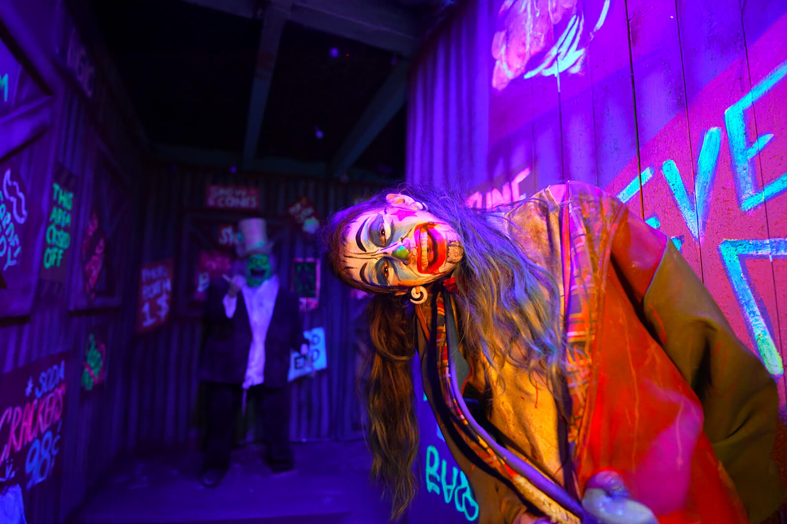 Two performers at Fear Overload Scream Park, a haunted house experience in Newark