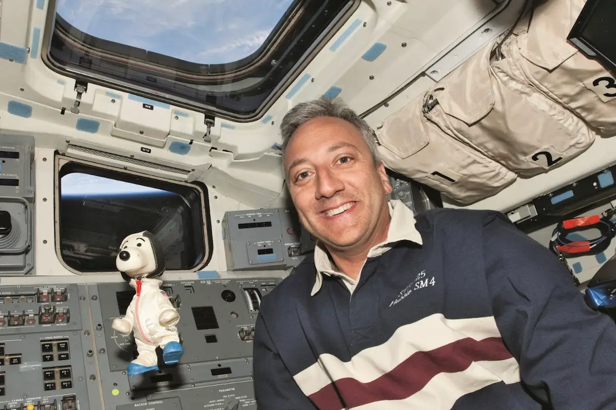 Mike Massimo with Snoopy in space for Shultz Museum