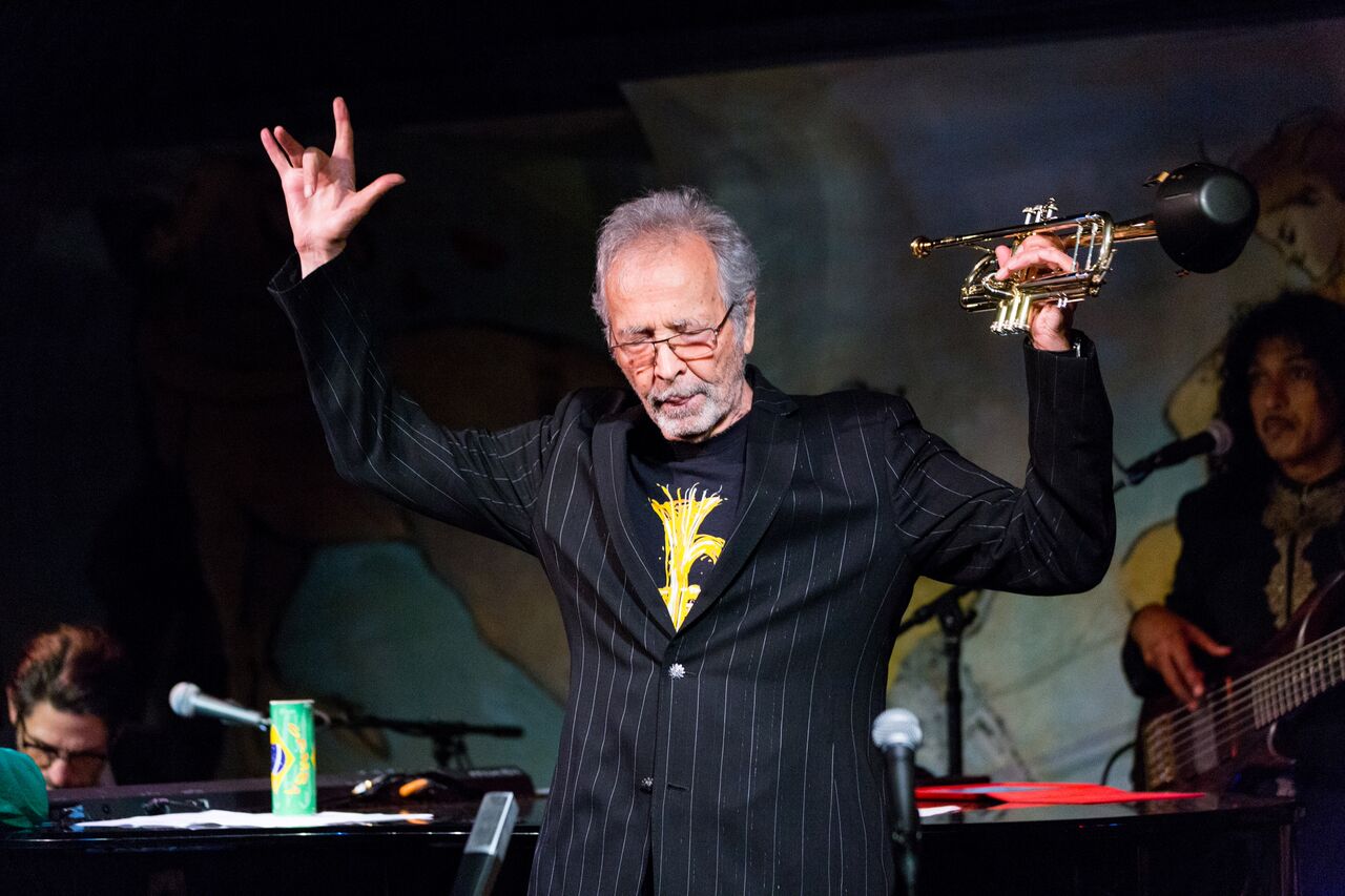 Trumpet player Herb Alpert performs on stage