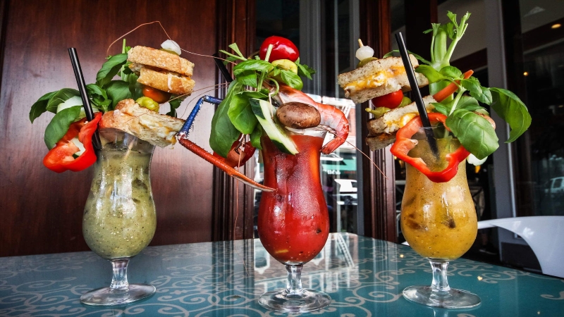 Bloody Marys with food coming out of them at Bloody Mary Competition