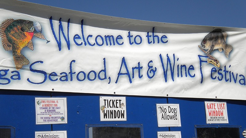Welcome sign for Bodega Seafood Art and Wine Festival in Sonoma County, California.