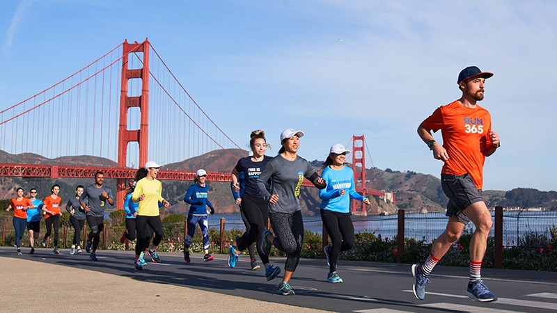 Runner pass vista of Golden Gate Bridge in San Francisco Marathon