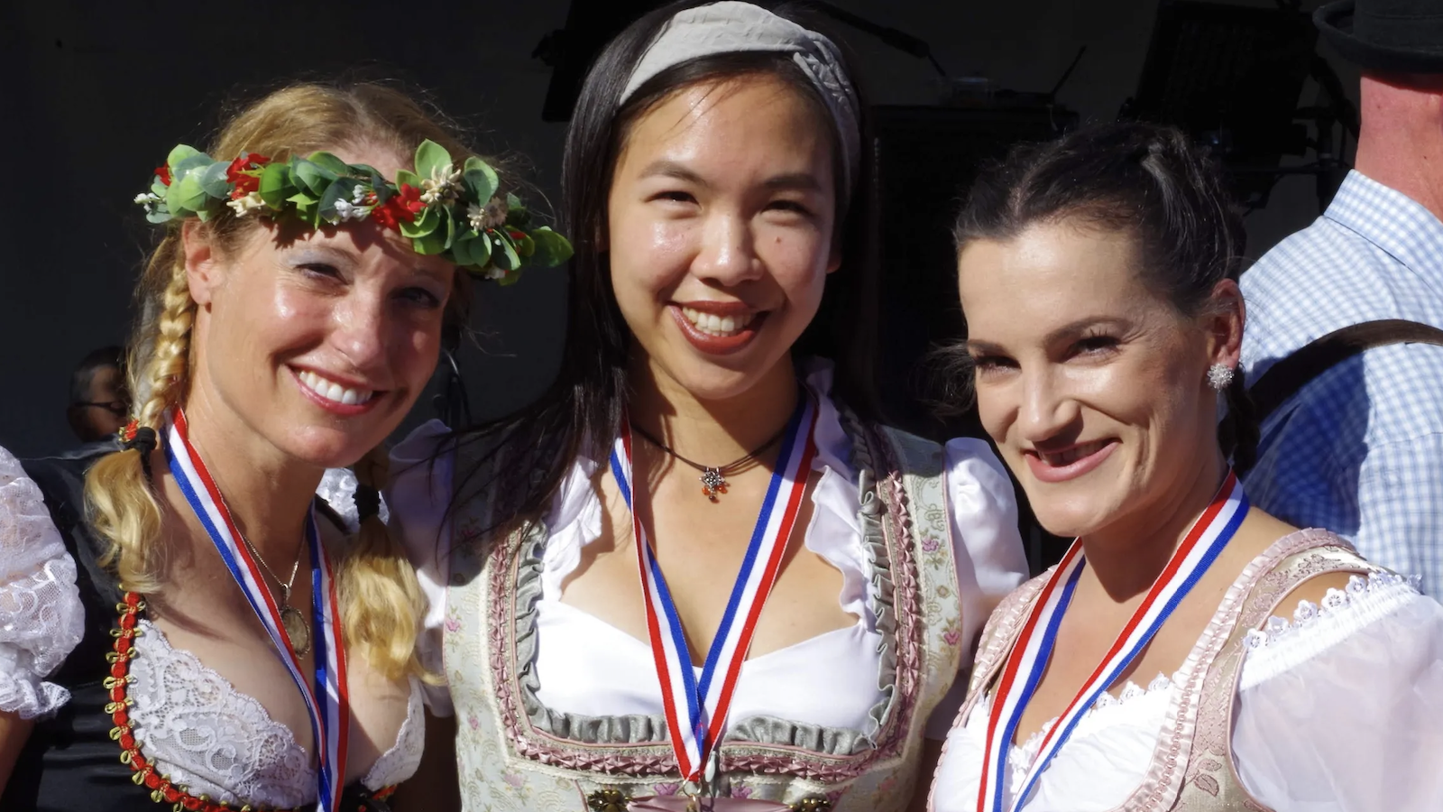 Three women in costume at Campbell Oktoberfest.