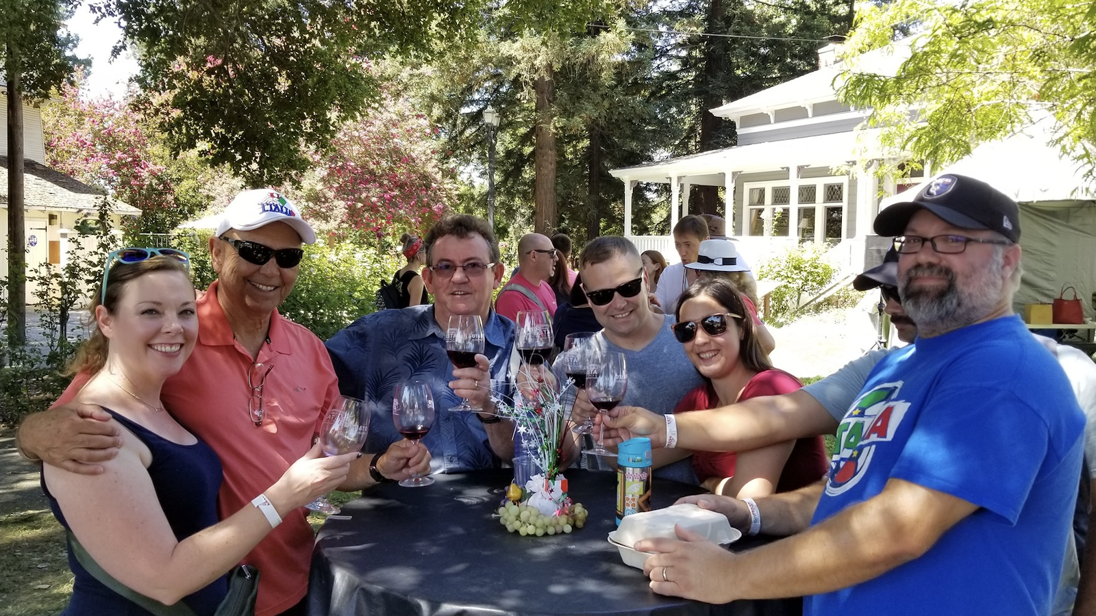 People toast wine at South Bay event, Italian Family Festa
