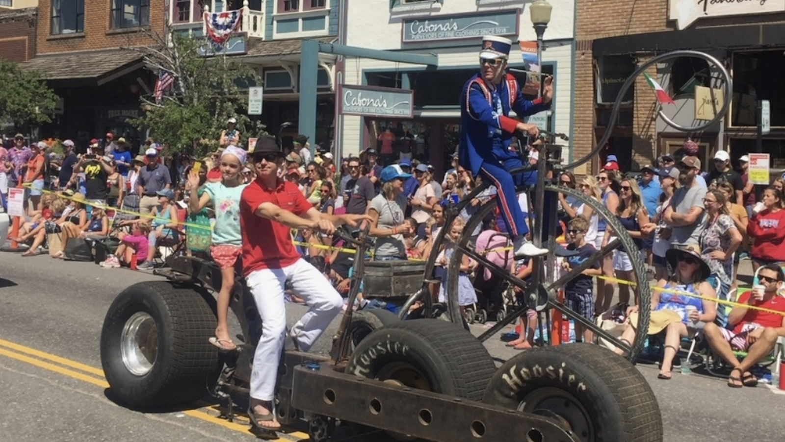 Three-seater bike with giant wheels at Fourth of July Parade Tahoe