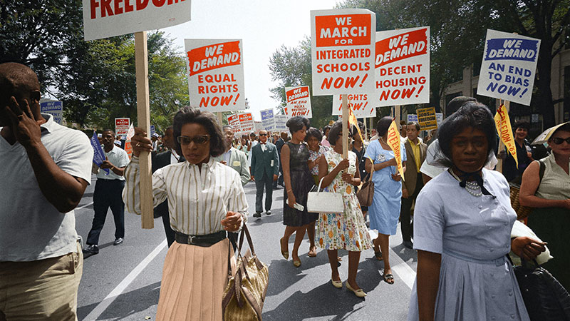 Civil Rights Protestors marching with signs