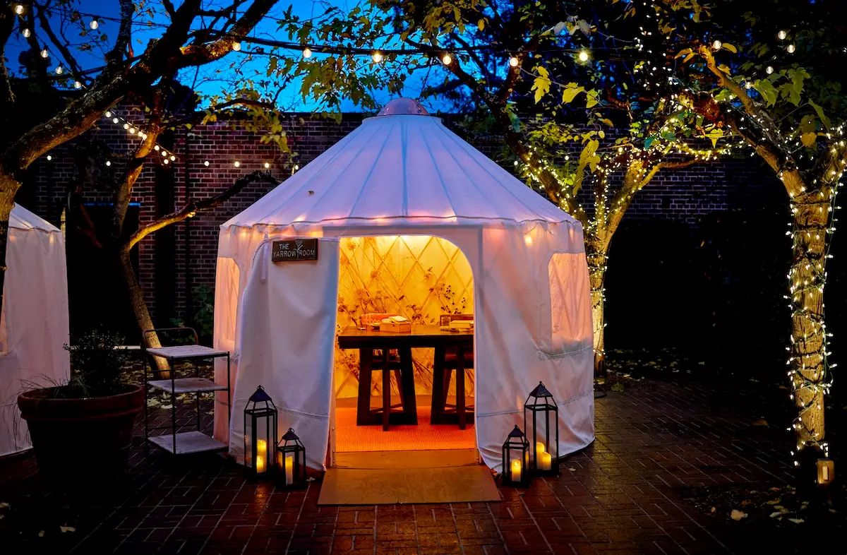 A yurt set up for dinner