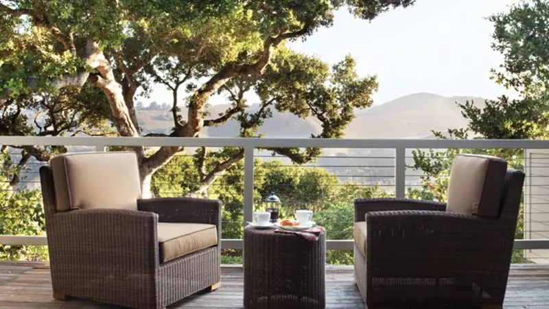Balcony with lounge chairs at the Carmel Valley Ranch