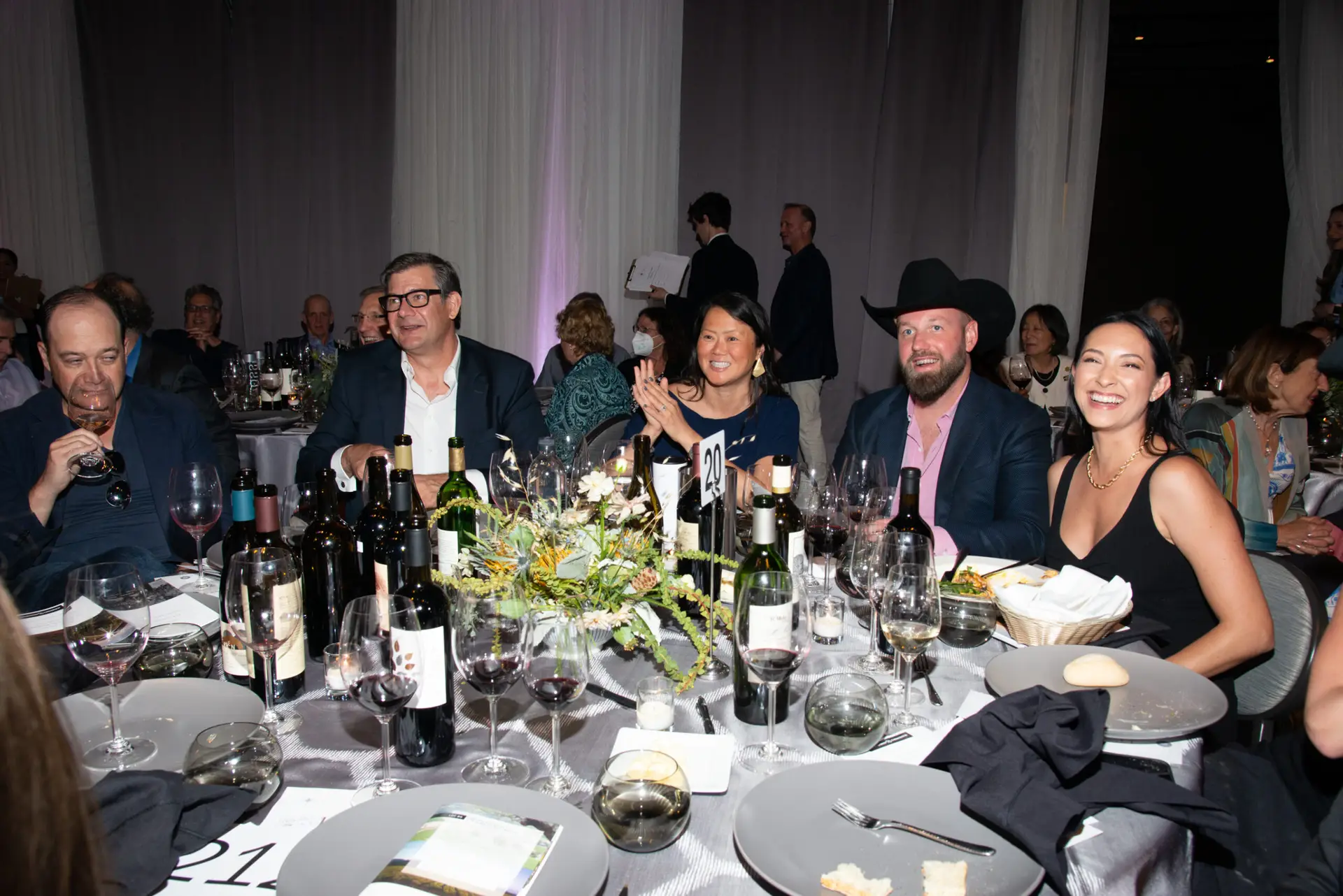 Guests sit at table for Inspire Napa Valley gala.