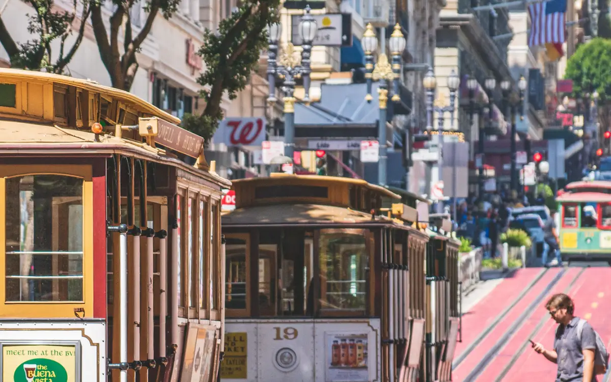 Powell and Hyde Street Cable Cars go down hill in San Francisco, California