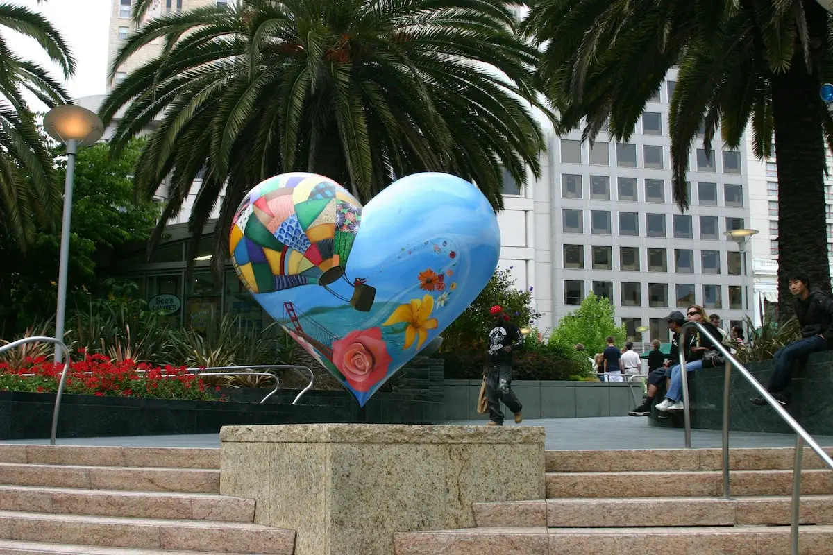 Union Square Heart Sculpture showing girl in hot air balloon above Golden Gate Bridge in San Francisco, California
