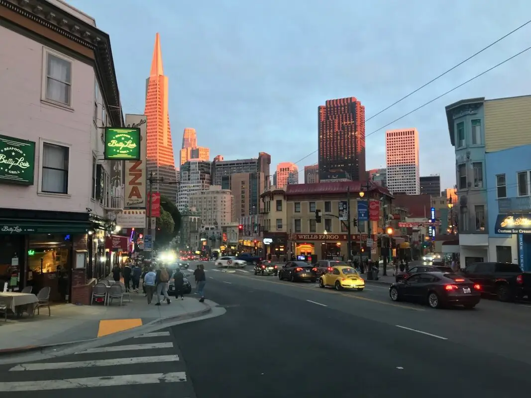 Transamerica Pyramid and streets of North Beach at sunset in San Francisco, California