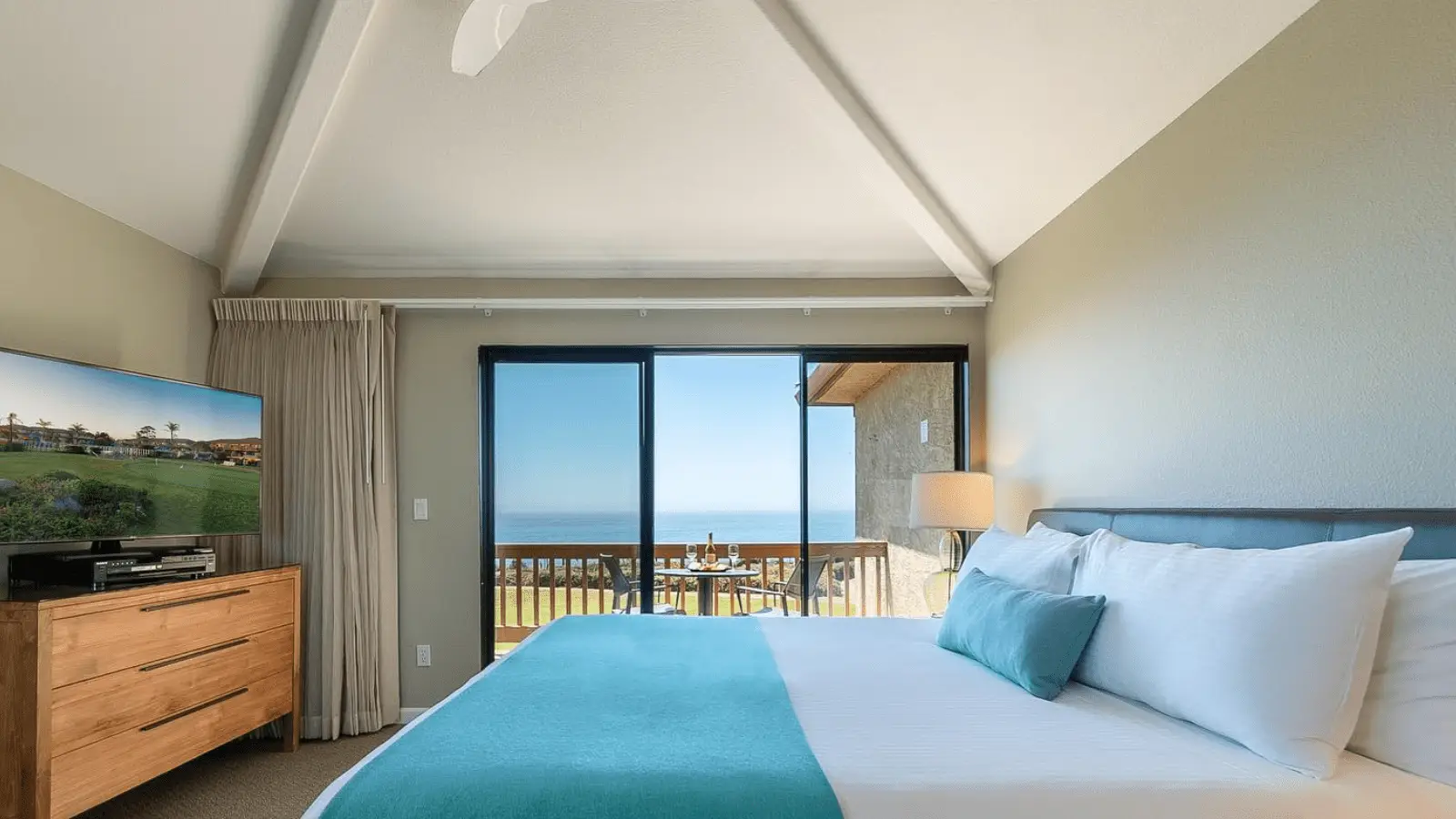 hotel room with queen bed and views of the Monterey Bay at Seascape Beach Resort in Santa Cruz, California