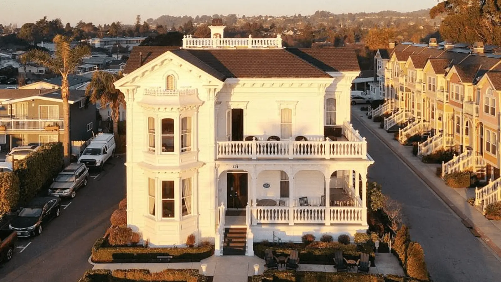 Exterior of the large white Victorian bed & breakfast, West Cliff Inn in Santa Cruz, California