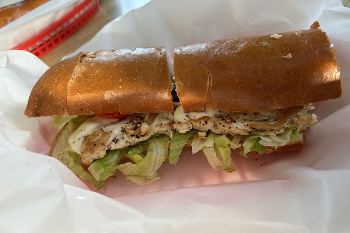 An Italian Delite sandwich cut in half.