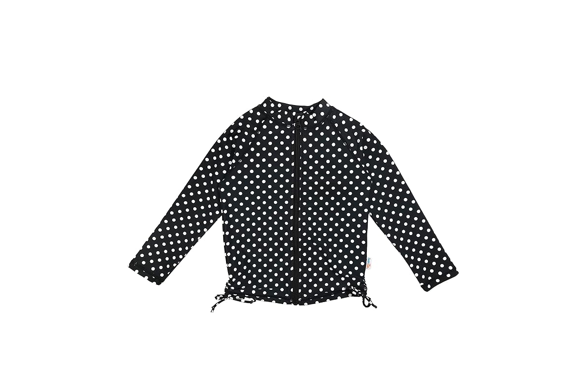 A black and white polka dot zip up jacket with long sleeves.