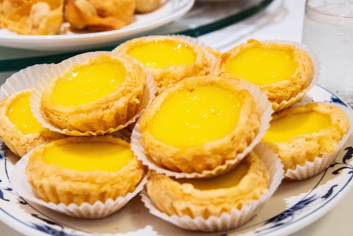 A pile of egg tarts.