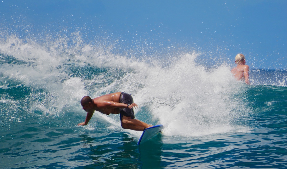 surfers surfing