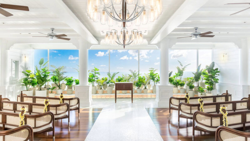 Kahawai Chapel with rattan seating, ocean views, and Hawaiian-inspired design at OUTRIGGER Waikiki.