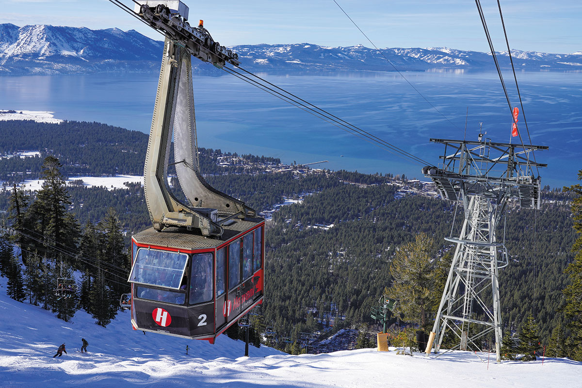 A ski lift with a cable car suspended, ready to transport skiers up the mountain.