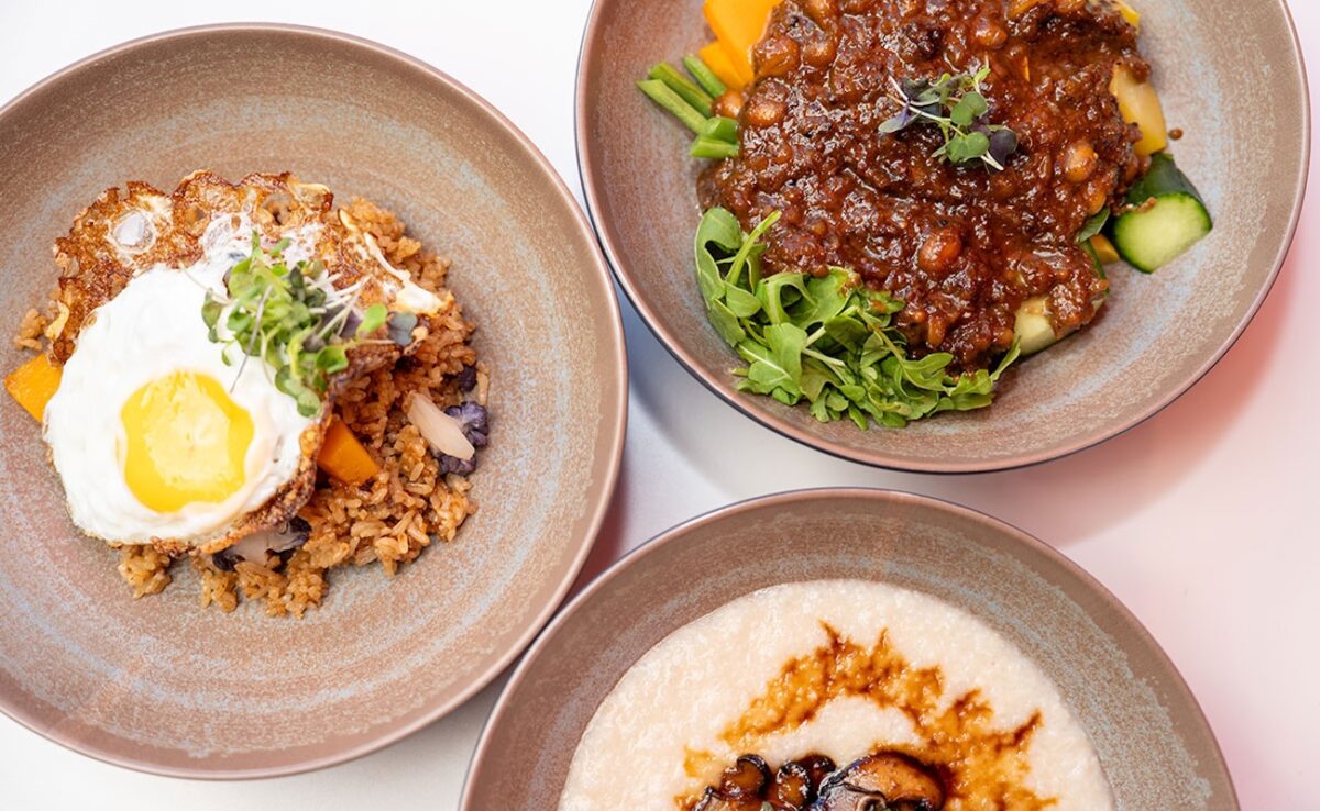 Three plates with different dishes plated nicely.