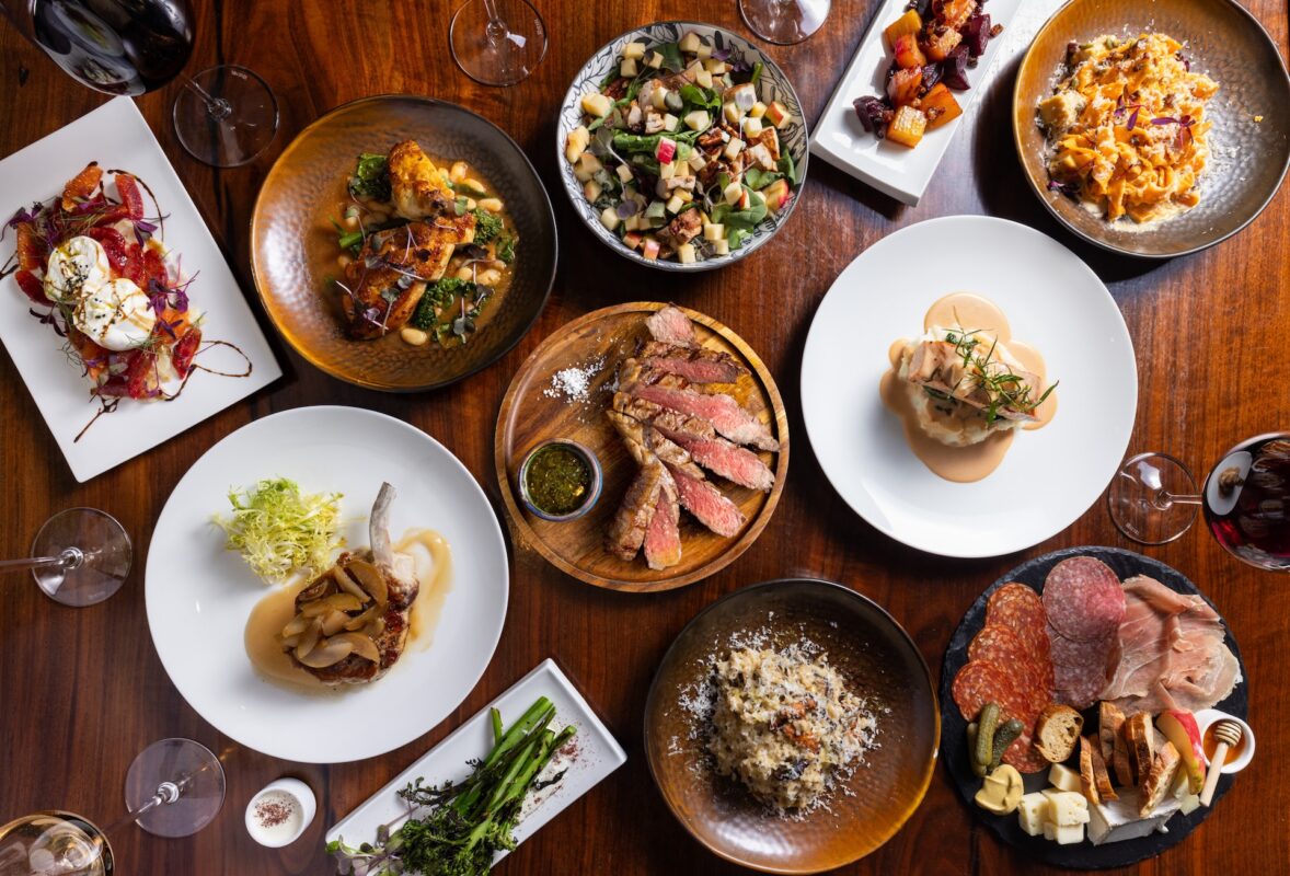 An aerial spread of plates with food.