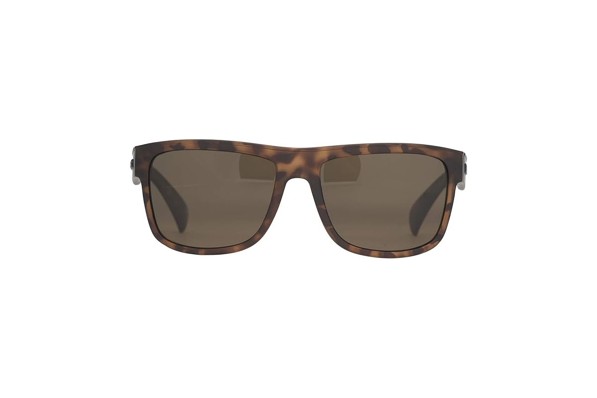 Image shows sunglasses with warm brown lenses and a tortoise frame.