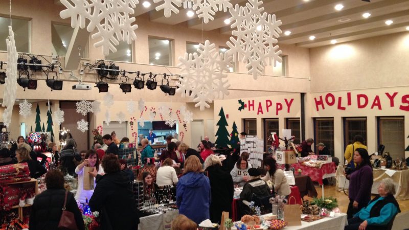 Attendees browse items at the Holiday Crafts Faire in Novato