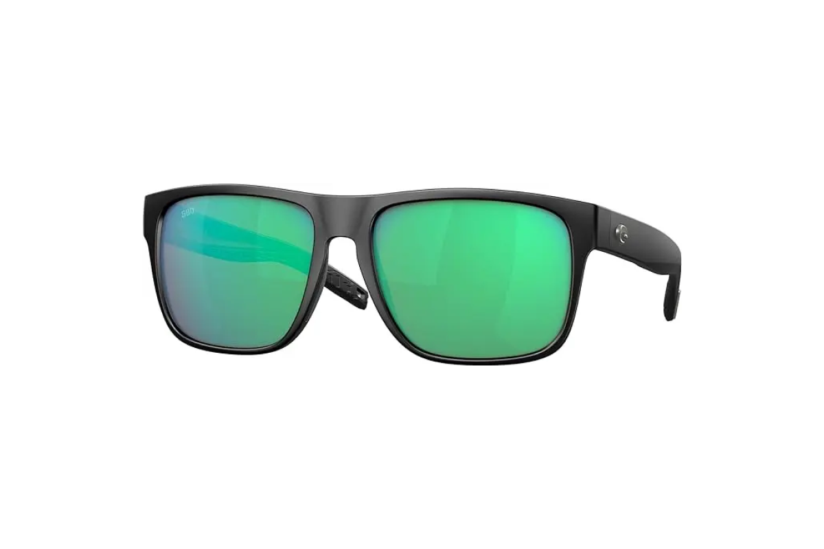 A pair of sunglasses with a thick, black plastic rim and green lenses.