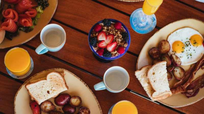 A table full of breakfast food at Oceana's Coastal Kitchen in San Diego